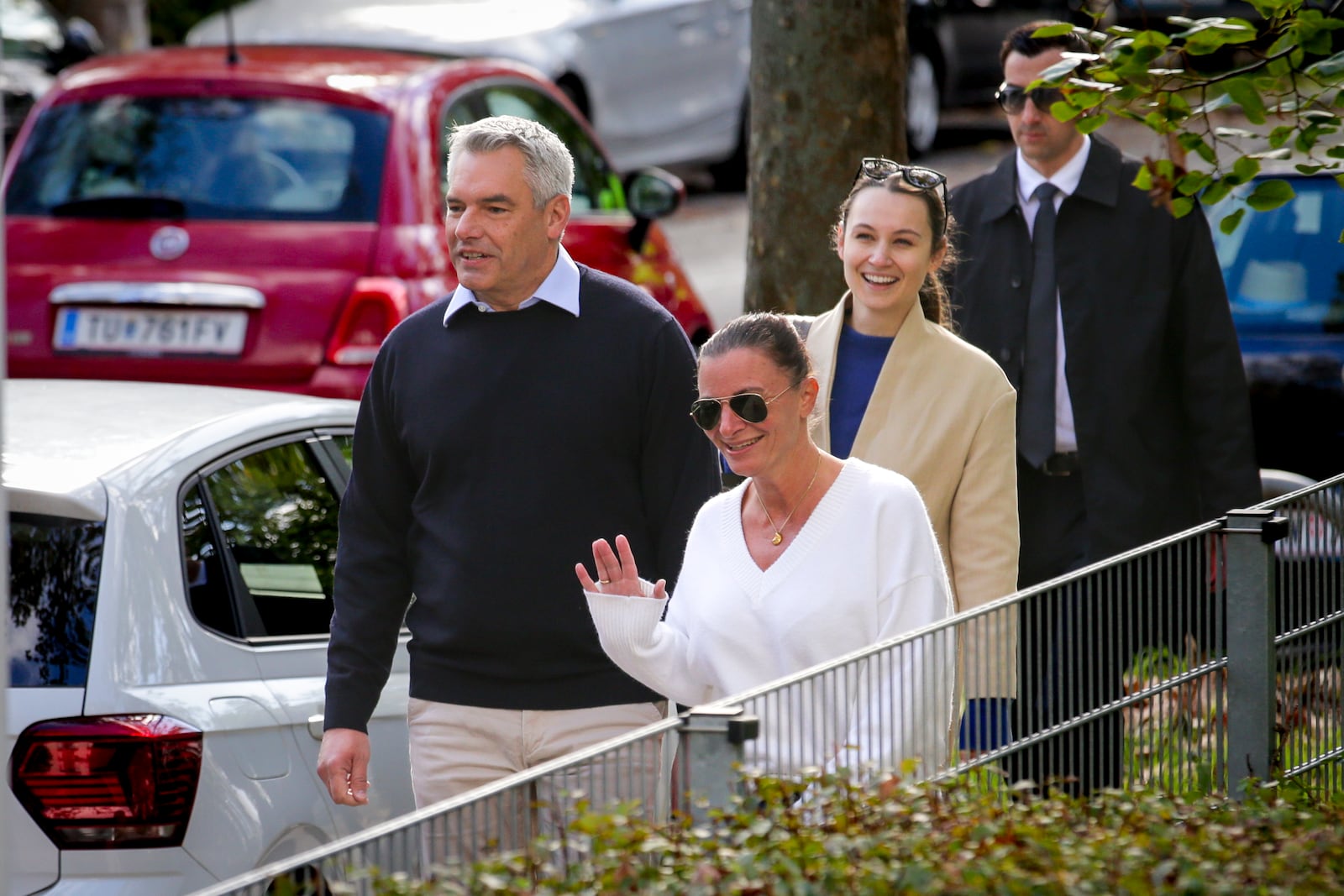 Austrian Chancellor Karl Nehammer and his wife Katharina arrive at a polling station in Vienna, Austria, Sunday, Sept. 29, 2024, to cast their votes in the country's national election. (AP Photo/Heinz-Peter Bader)