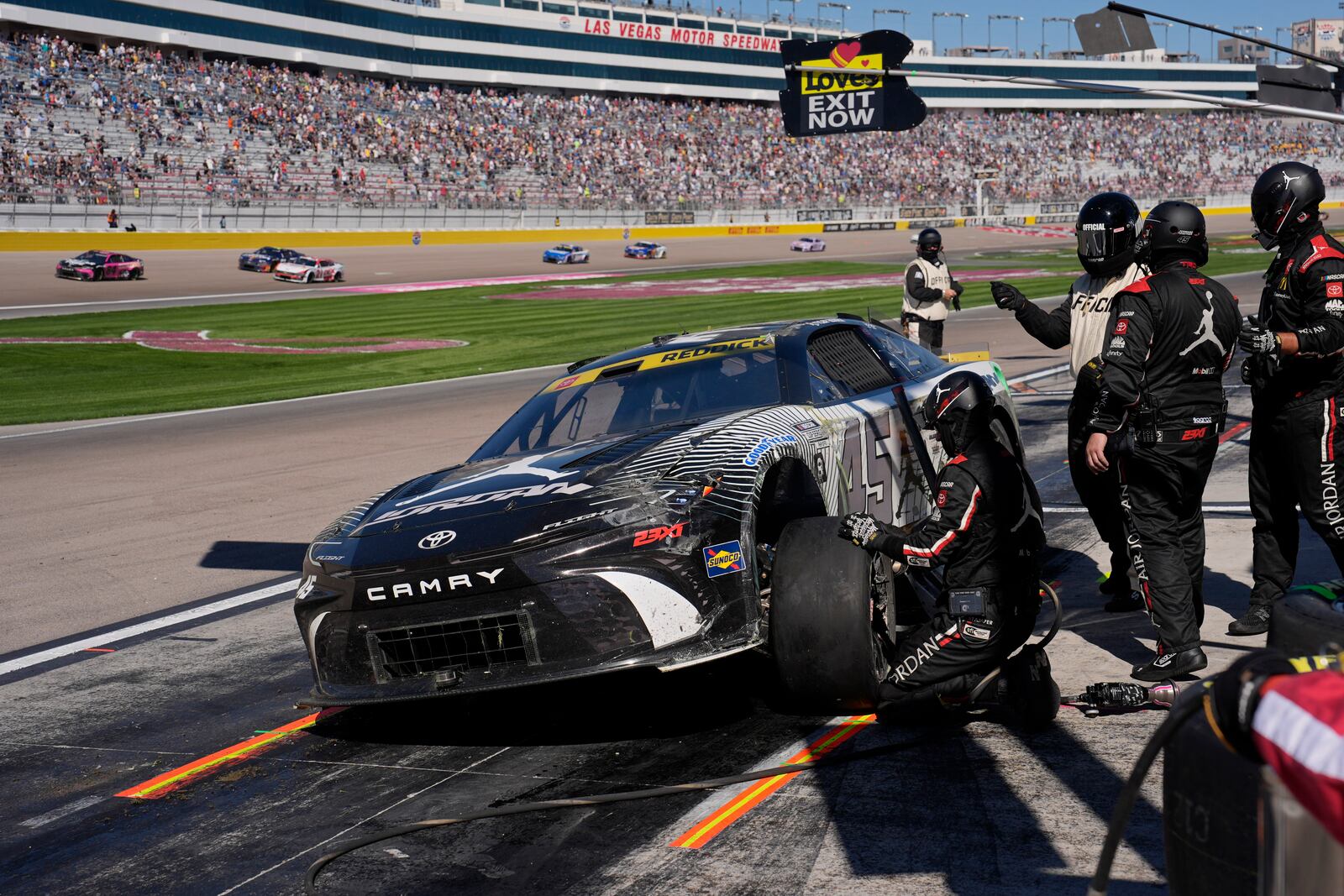 NASCAR Cup Series driver Tyler Reddick makes a pit stop after a crash during a NASCAR Cup Series auto race Sunday, Oct. 20, 2024, in Las Vegas. (AP Photo/John Locher)