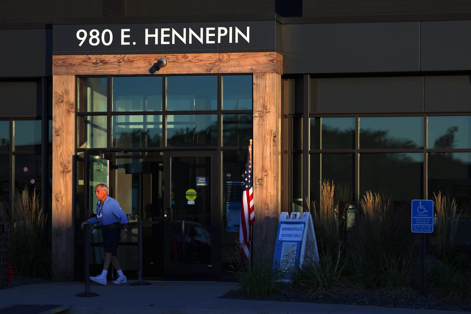 Election staff set up at the City of Minneapolis early voting center on the first day of early voting, Friday, September 20, 2024, in Minneapolis, Minn. (AP Photo/Adam Bettcher)