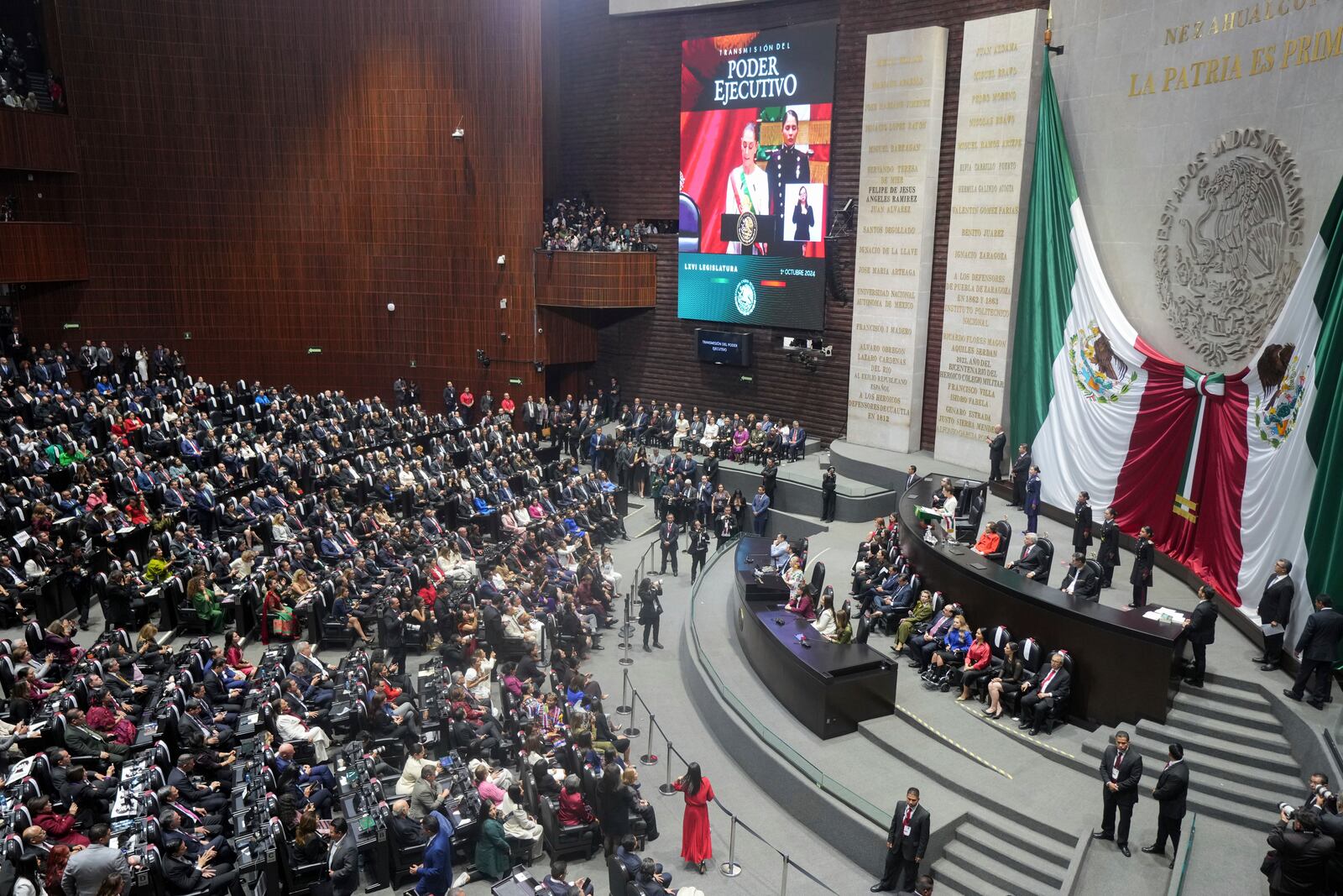 President Claudia Sheinbaum speaks on her inauguration day after being sworn in at Congress in Mexico City, Tuesday, Oct. 1, 2024. (AP Photo/Fernando Llano)