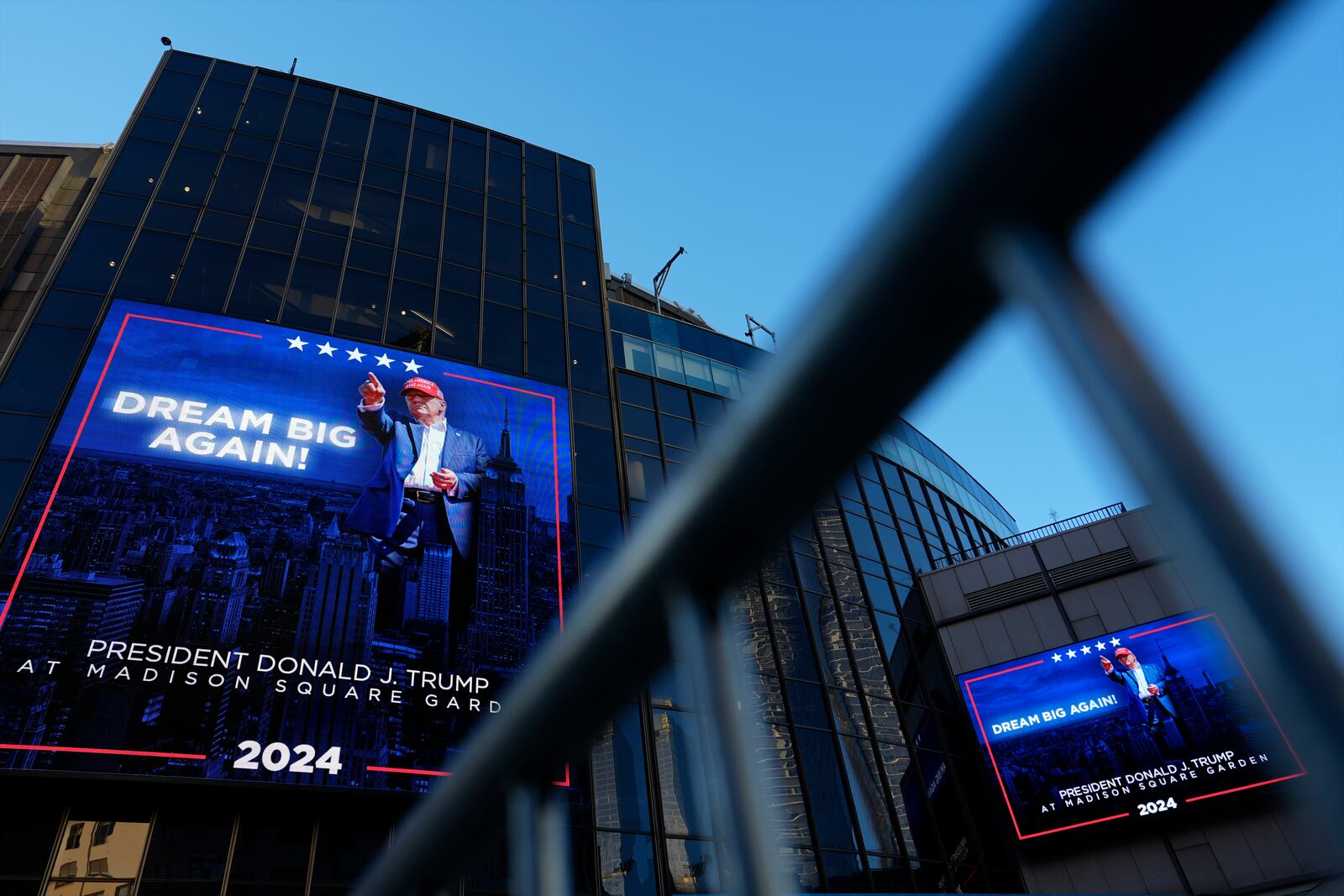 Video boards outside Madison Square Garden display information about the campaign rally for Republican presidential nominee former President Donald Trump Sunday, Oct. 27, 2024, in New York. (AP Photo/Julia Demaree Nikhinson)