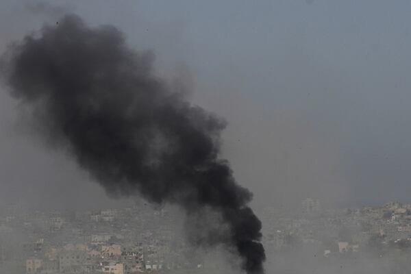 Smoke rises to the sky in the Gaza Strip as seen from southern Israel, Wednesday, April 30, 2025. (AP Photo/Ohad Zwigenberg)