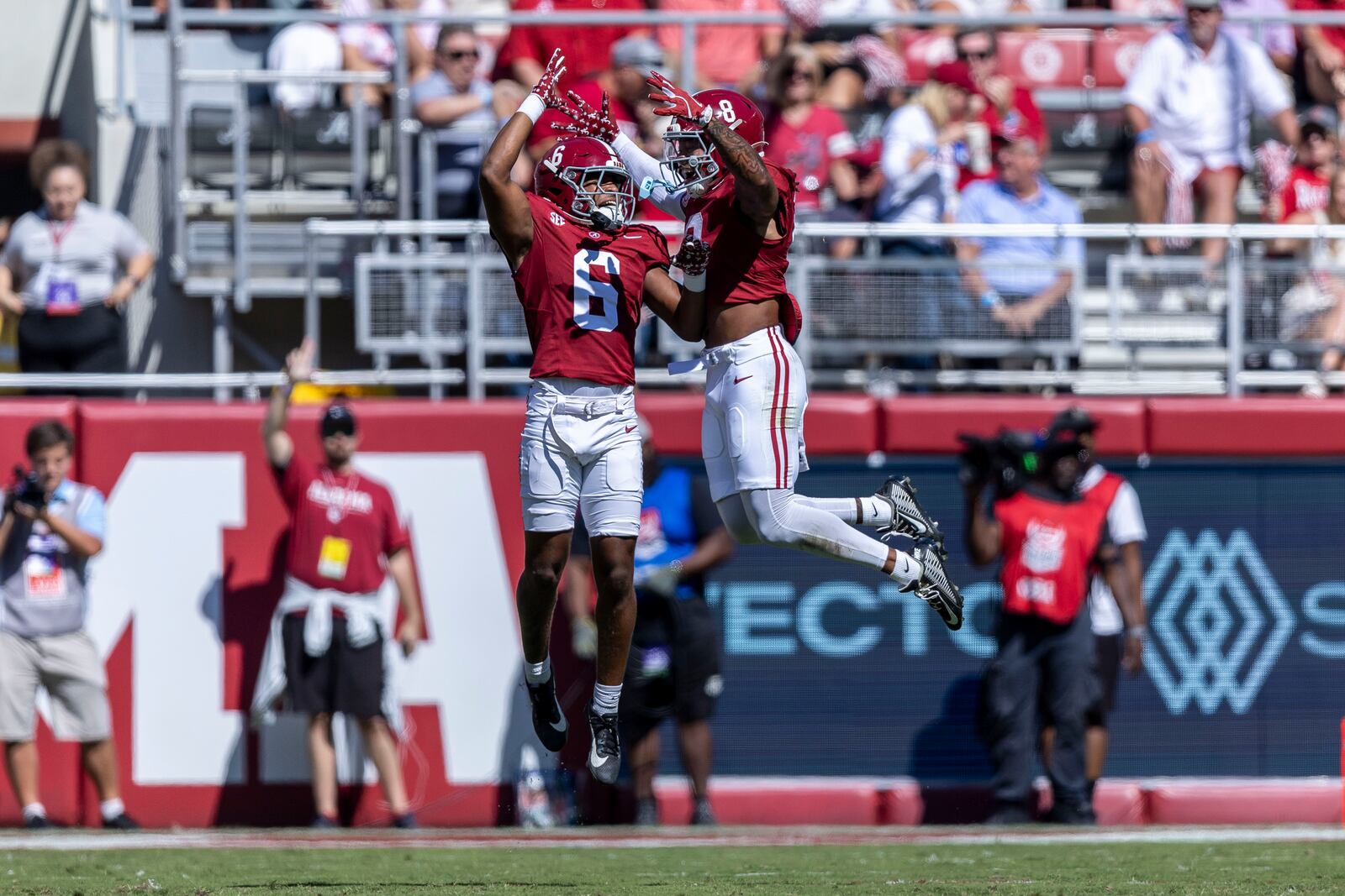 Alabama defensive backs Kameron Howard (6) and DeVonta Smith (8) celebrate a defensive stop against South Carolina during the first half of an NCAA college football game, Saturday, Oct. 12, 2024, in Tuscaloosa, Ala. (AP Photo/Vasha Hunt)