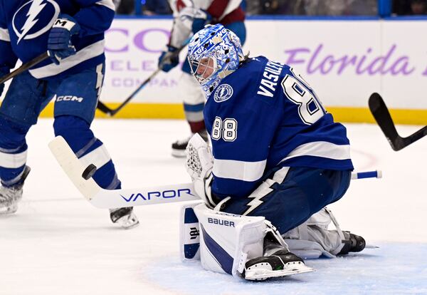 Tampa Bay Lightning goaltender Andrei Vasilevskiy makes a save during the first period of an NHL hockey game against the Colorado Avalanche Monday, Nov. 25, 2024, in Tampa, Fla. (AP Photo/Jason Behnken)