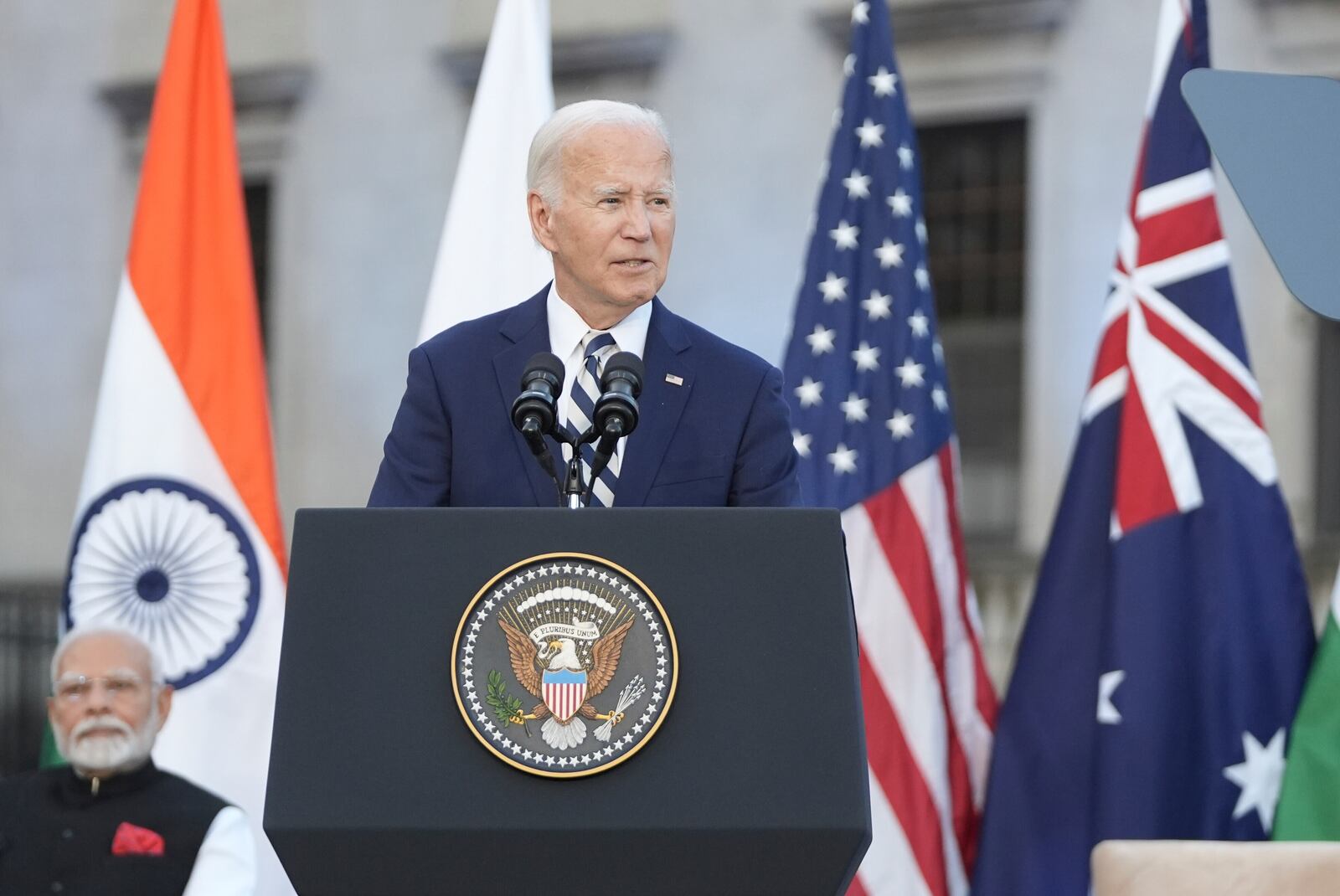 President Joe Biden, joined by Australia's Prime Minister Anthony Albanese, Japan's Prime Minister Fumio Kishida, and India's Prime Minister Narendra Modi speaks about a Quadrilateral Cancer Moonshot initiative on the sidelines of the Quad leaders summit at Archmere Academy in Claymont, Del., Saturday, Sept. 21, 2024. (AP Photo/Mark Schiefelbein)