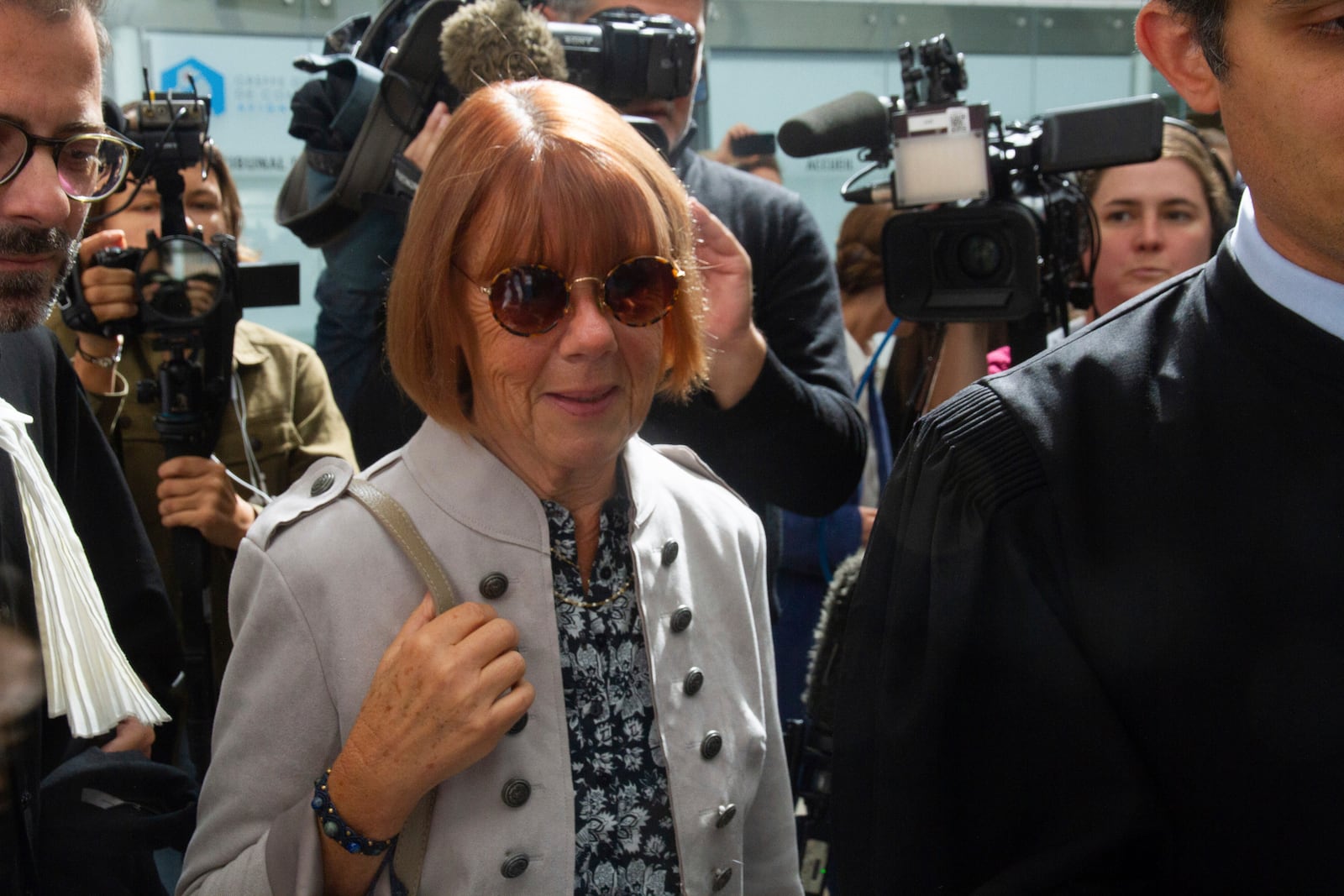 Gisele Pelicot arrives at the Avignon court house, in Avignon, southern France, Tuesday, Sept. 17, 2024. Her ex-husband admitted in court that for nearly a decade, he repeatedly drugged his unwitting wife and invited dozens of men to rape her while she lay unconscious. (AP Photo/Diane Jantet)