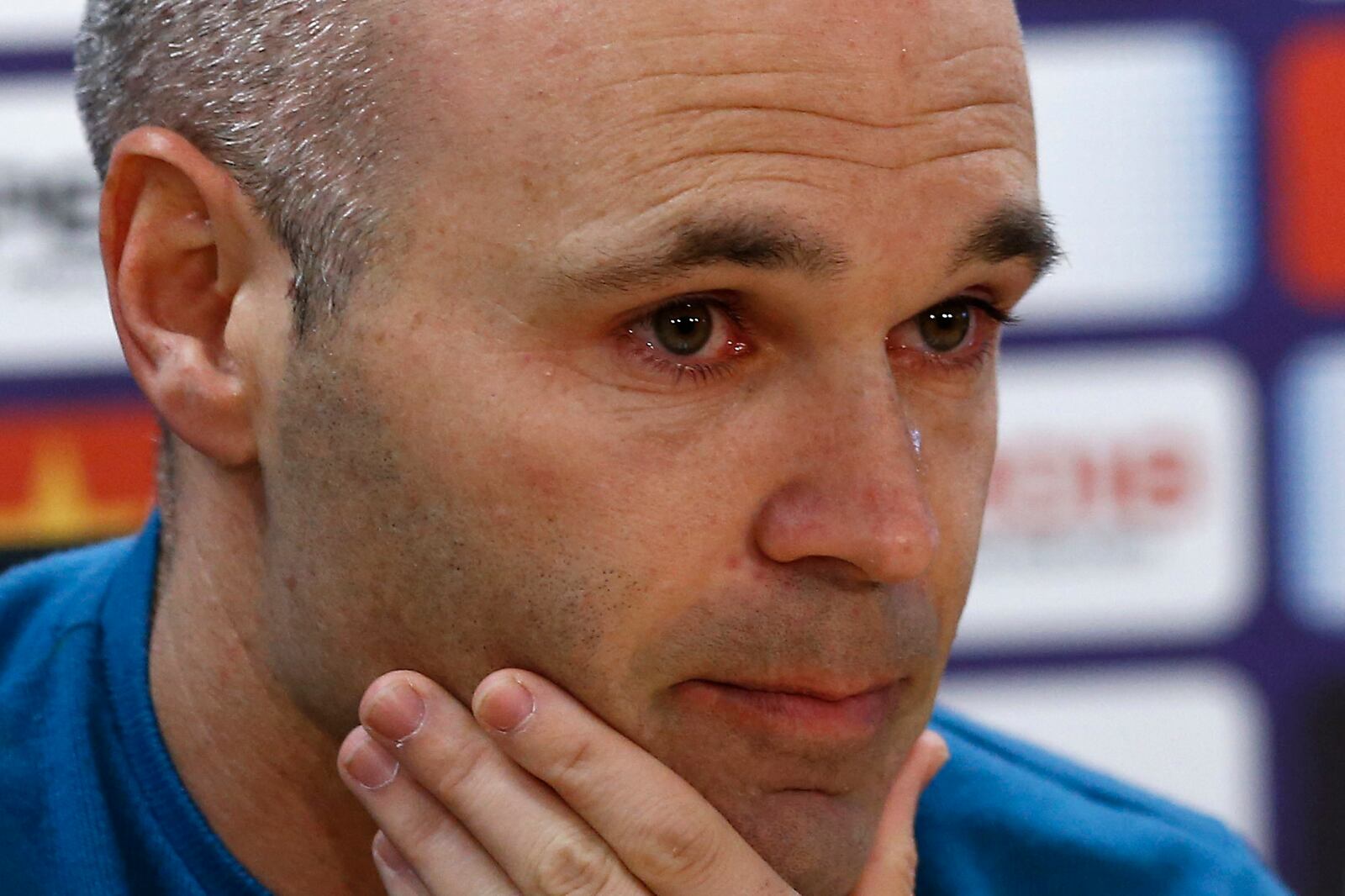 FILE - Barcelona's Andres Iniesta reacts during a news conference announcing he is leaving the club, in Barcelona, Spain, on April. 27, 2018. Andres Iniesta who scored Spain's World Cup-winning goal in 2010 and was one of the key players who made Barcelona's tiki-taka thrive for so long, announced his retirement from soccer on Tuesday. (AP Photo/Manu Fernandez, File)