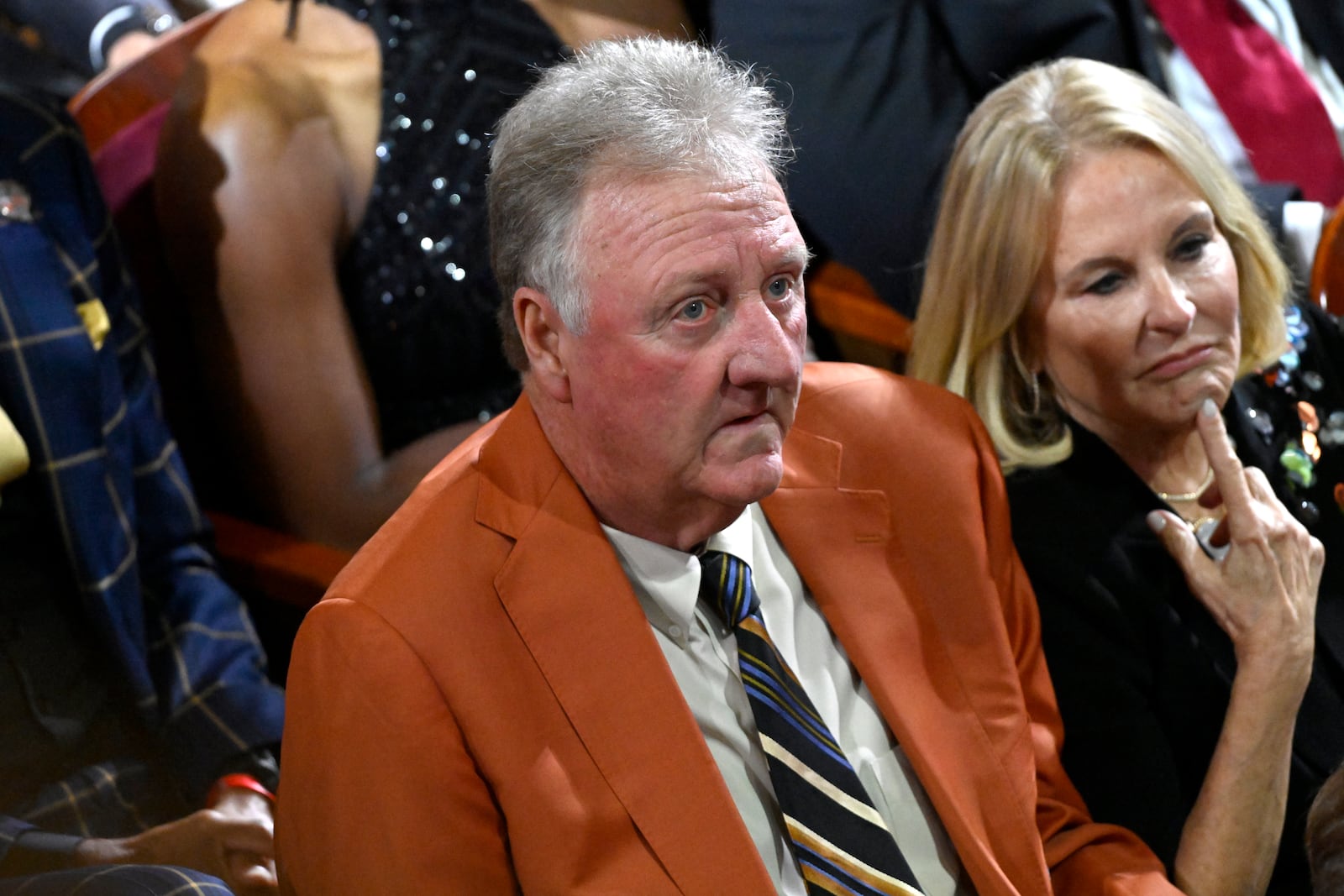 Larry Bird looks on during Basketball Hall of Fame enshrinement ceremonies, Sunday Oct. 13, 2024, in Springfield, Mass. (AP Photo/Jessica Hill)