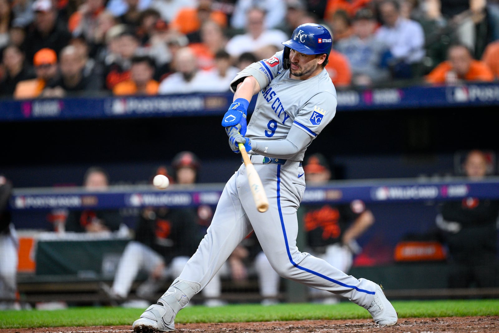 Kansas City Royals' Vinnie Pasquantino connects for a single against the Baltimore Orioles during the fifth inning in Game 2 of an AL Wild Card Series baseball game, Wednesday, Oct. 2, 2024 in Baltimore. (AP Photo/Nick Wass)