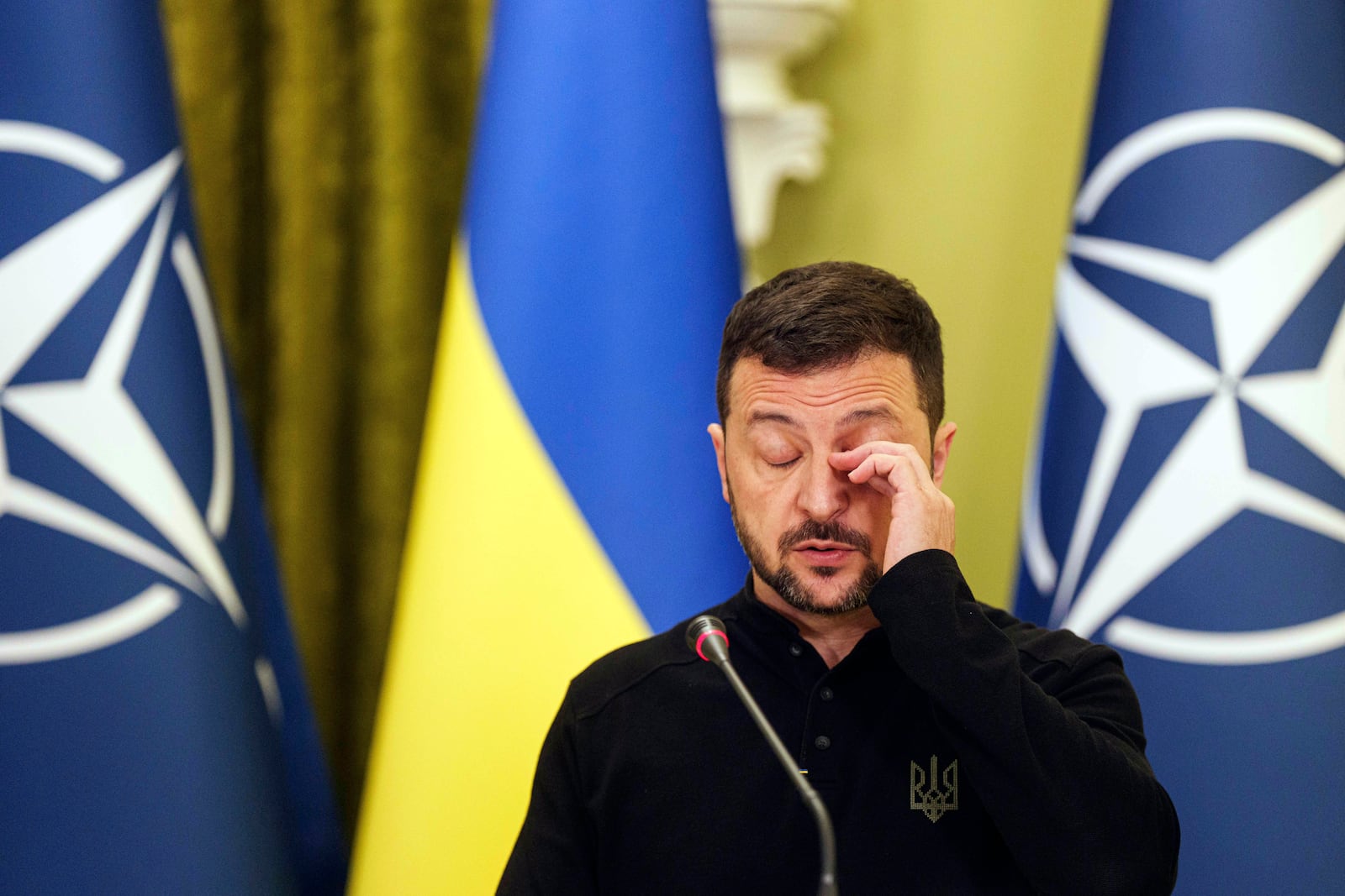 Ukrainian President Volodymyr Zelenskyy speaks to journalists during a joint press conference with NATO Secretary General Mark Rutte in Kyiv, Ukraine, Thursday Oct. 3, 2024. (AP Photo/Evgeniy Maloletka)