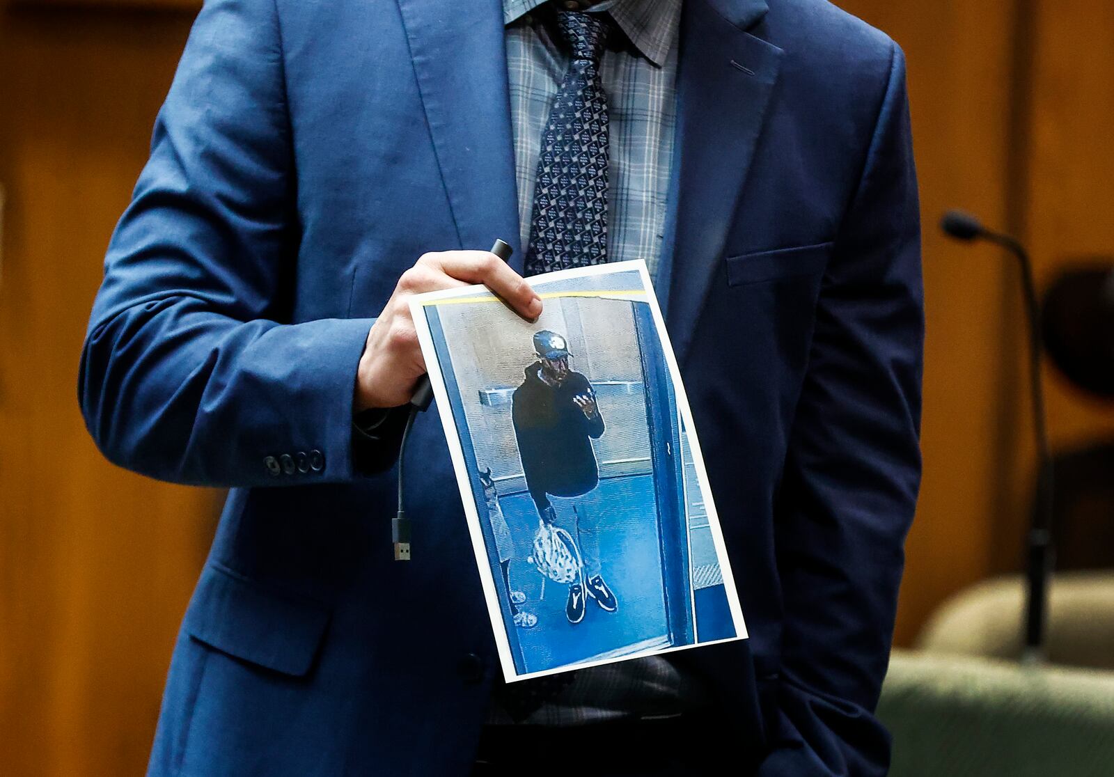 Paul Hagerman, Shelby County Deputy District Attorney, shows the jury a photo of defendant Justin Johnson during the murder trial of rapper Young Dolph in Memphis, Tenn., Monday, Sept. 23, 2024. (Mark Weber/Daily Memphian via AP)