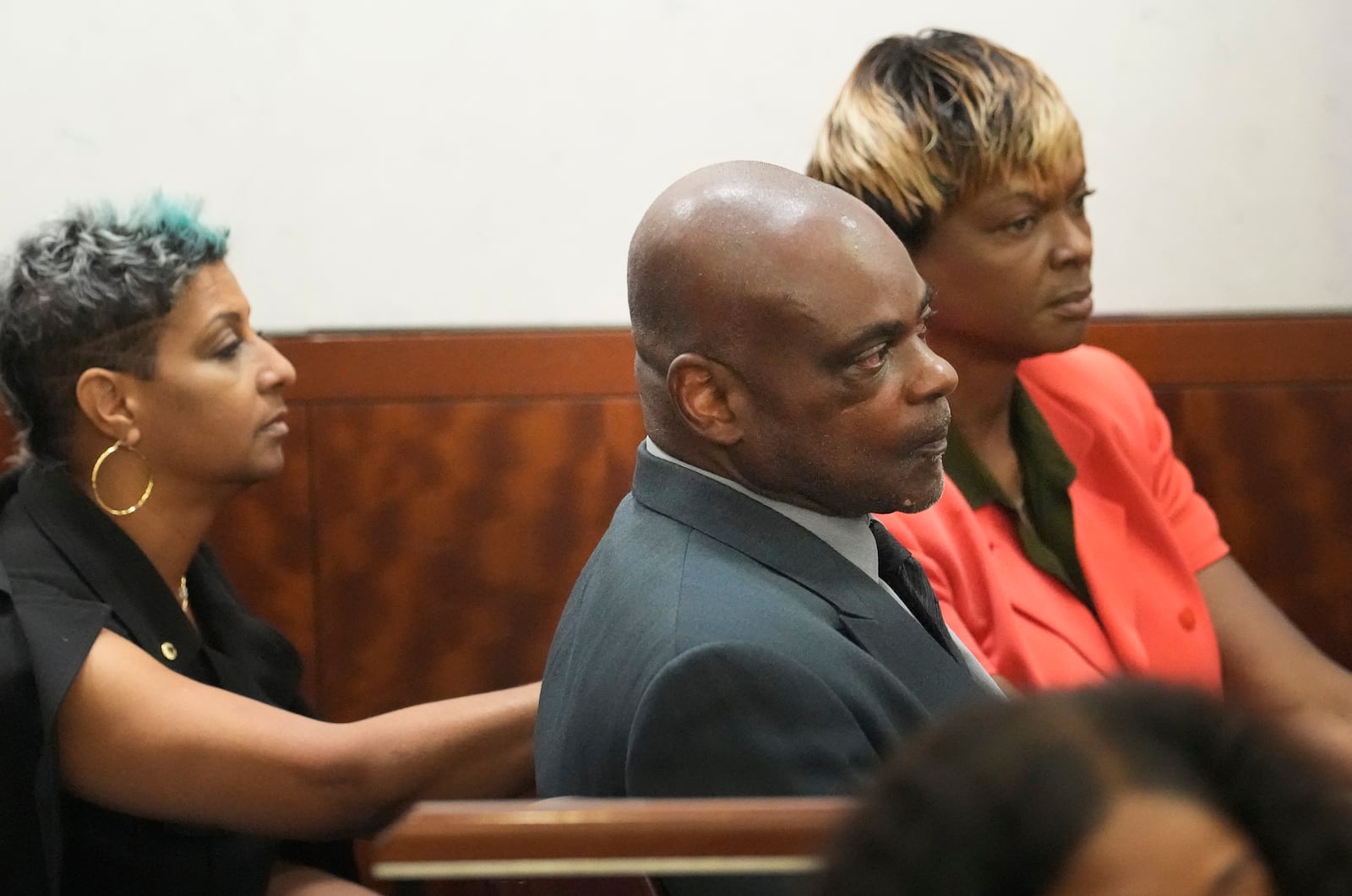 Former Houston police officer Gerald Goines, center, waits with family members for the jury to return to the 482nd District Court at the Harris County Criminal courthouse for the verdict in his murder trial, Wednesday, Sept. 25, 2024, in Houston (Melissa Phillip/Houston Chronicle via AP)