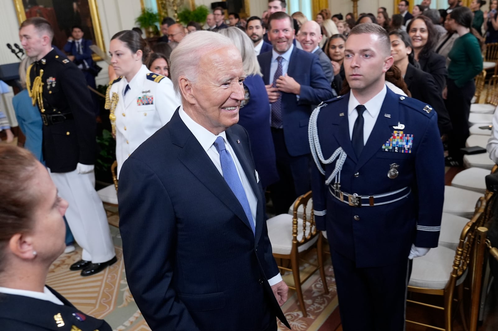 President Joe Biden walks out of the East Room of the White House in Washington, Monday, Sept. 23, 2024, following and event to welcome the NJ/NY Gotham FC and celebrate their 2023 NWSL championship. (AP Photo/Susan Walsh)