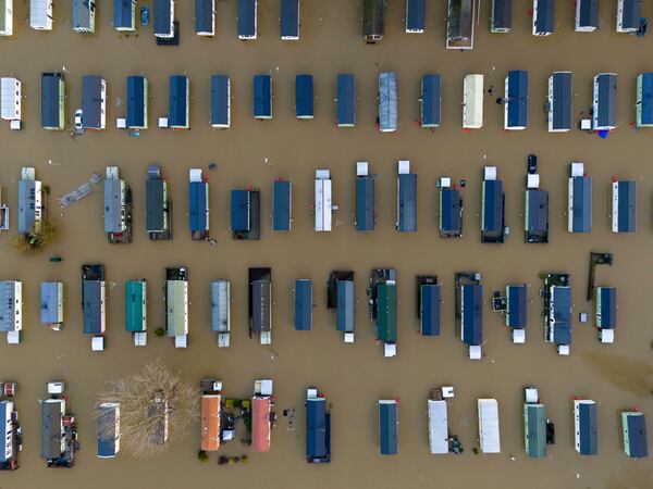 Flooded caravans at Billing Aquadrome Holiday Park, as Storm Bert continues to cause disruption, near Northampton, England, Monday, Nov. 25, 2024. (Jordan Pettitt/PA via AP)