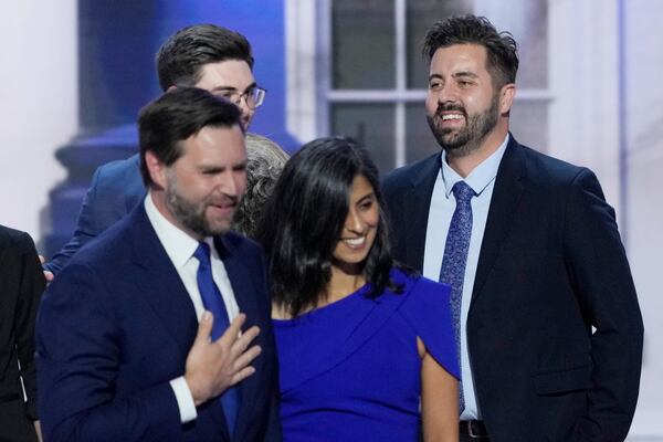 Cory Bowman, half-brother of Republican vice presidential candidate Sen. JD Vance, R-Ohio, from right, is pictured on stage with Usha Vance and JD Vance during the Republican National Convention, Wednesday, July 17, 2024, in Milwaukee. (AP Photo/J. Scott Applewhite)