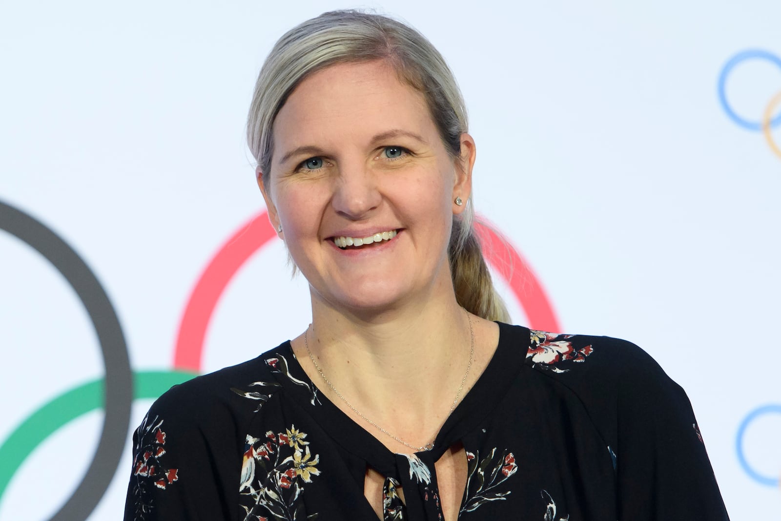 FILE - IOC member and former swimmer Kirsty Coventry smiles on the arrival for a press conference after the executive board meeting of the IOC, at the Olympic House, in Lausanne, Switzerland, Thursday, Jan. 9, 2020. (Laurent Gillieron/Keystone via AP, File)