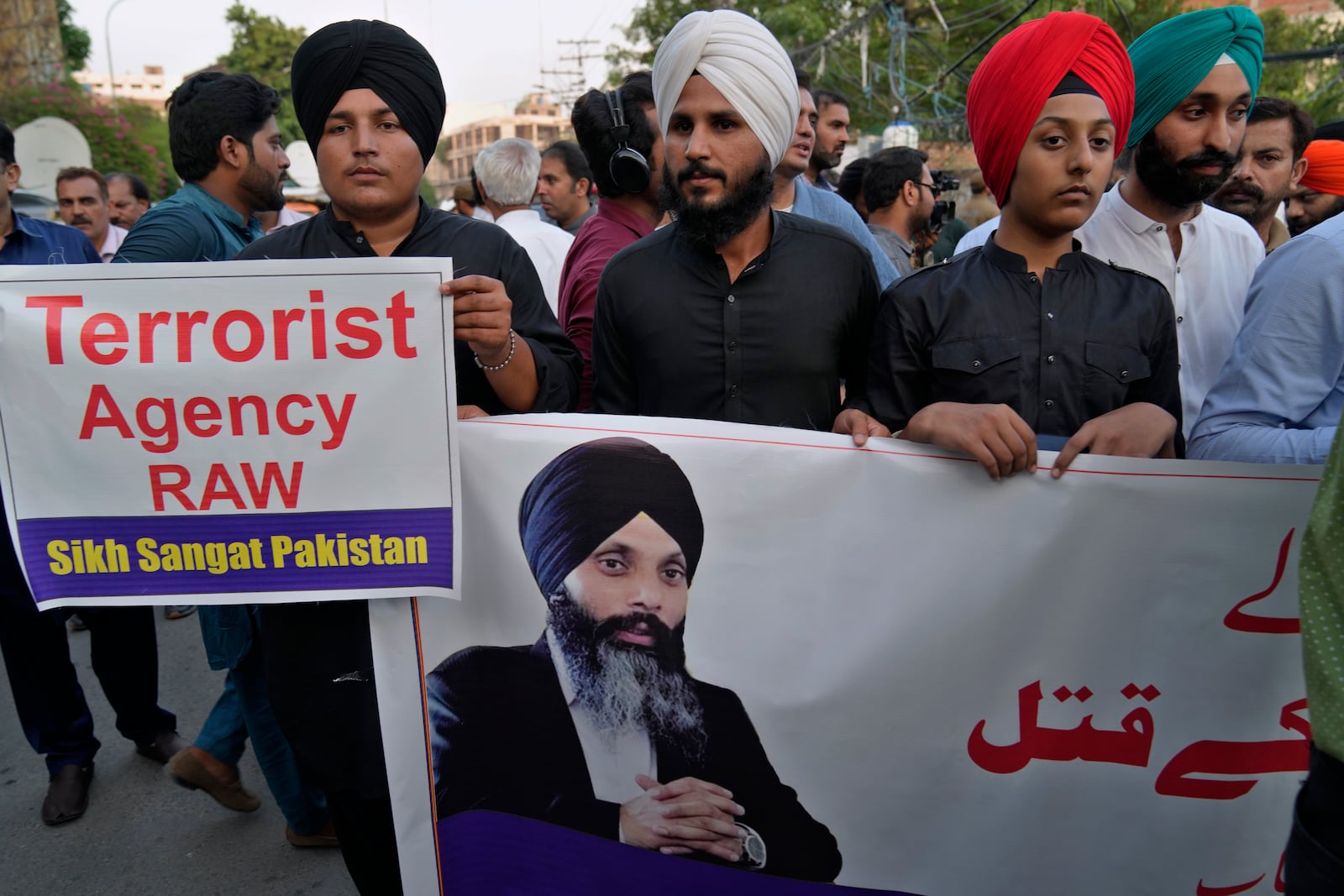 FILE -Members of Sikh community hold a protest against the killing of Hardeep Singh Nijjar, in Lahore, Pakistan, Sept. 20, 2023. (AP Photo/K.M. Chaudary, File)