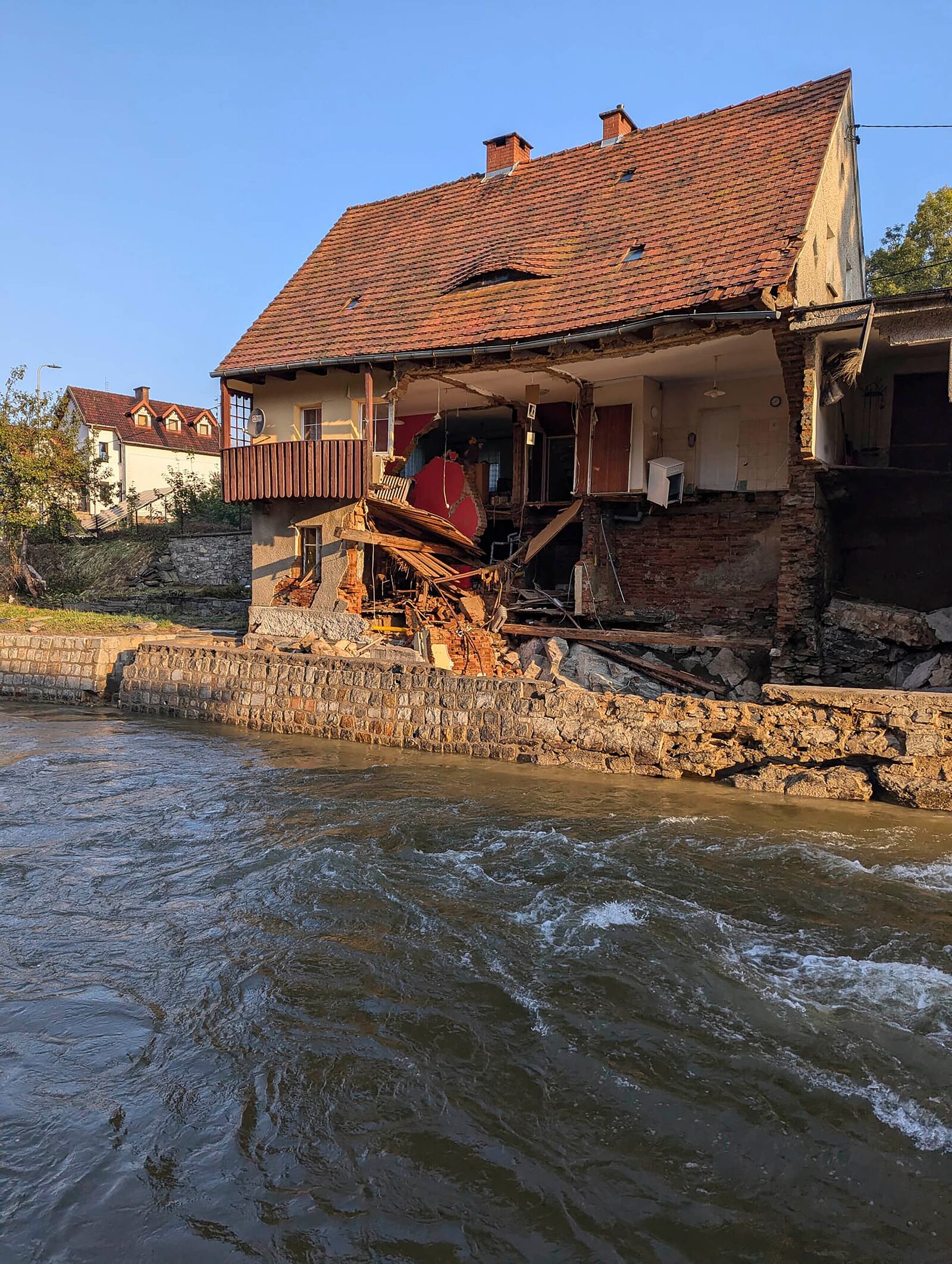 This handout photo provided by the State Fire Service of Poland, shows damages after the flooding in southwestern Poland, Ladek Zdroj, Poland, on Thursday, Sept. 19 , 2024. (Grzegorz Rozanski/KG PSP via AP)