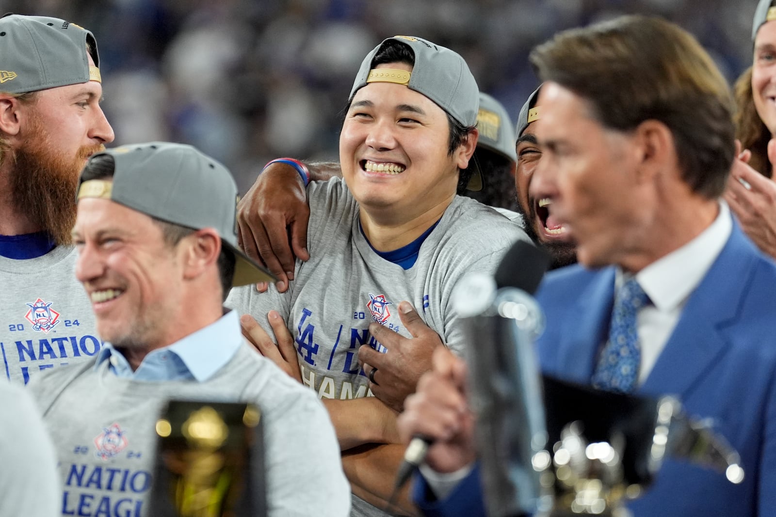 Los Angeles Dodgers' Shohei Ohtani celebrates after their win against the New York Mets in Game 6 of a baseball NL Championship Series, Sunday, Oct. 20, 2024, in Los Angeles. The Dodgers will face the New York Yankees in the World. (AP Photo/Ashley Landis)