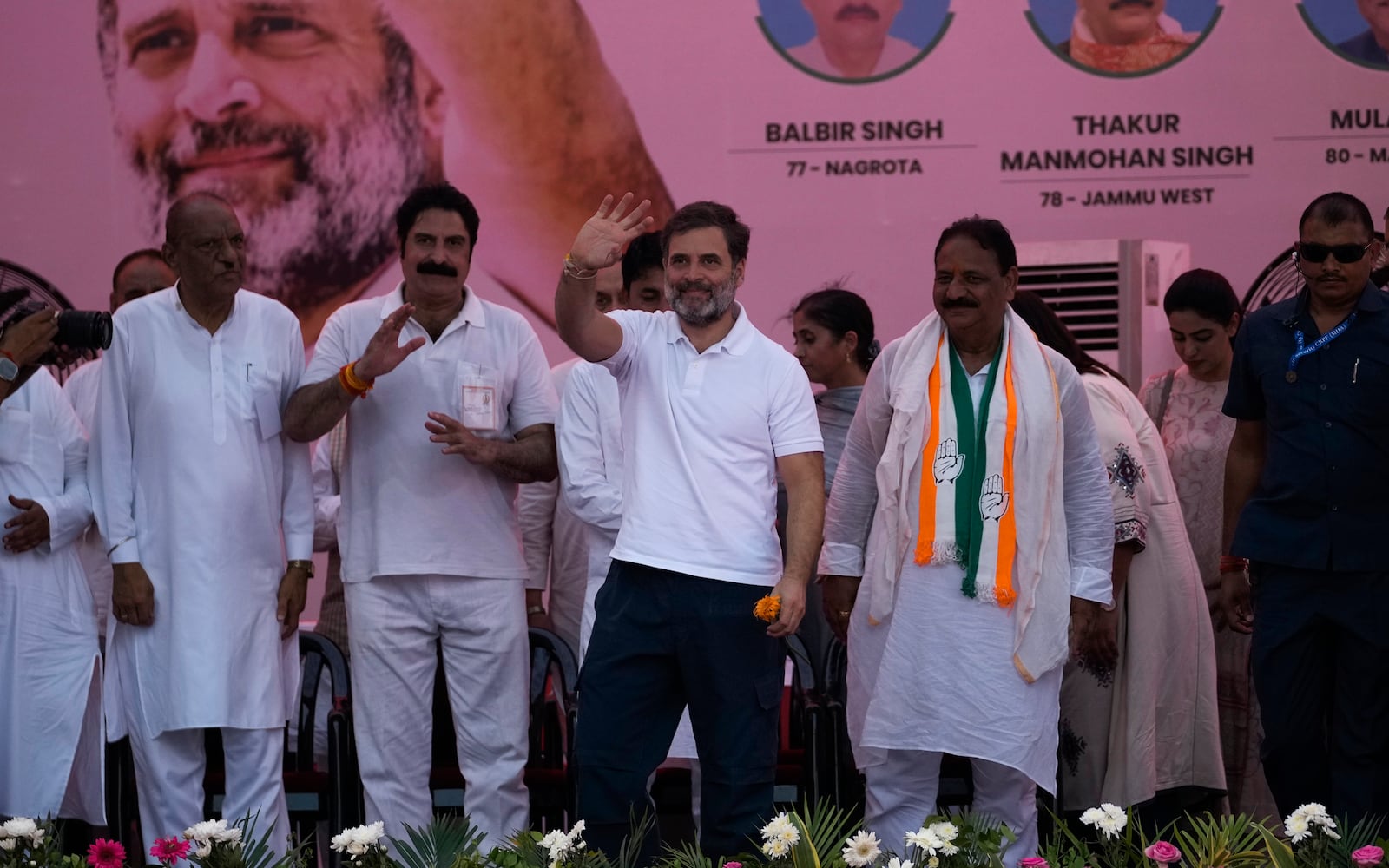 FILE- India's opposition Congress party leader Rahul Gandhi waves to supporters during a campaign rally of Jammu and Kashmir Assembly elections in Jammu, India, Sept.25, 2024.(AP Photo/Channi Anand, File)