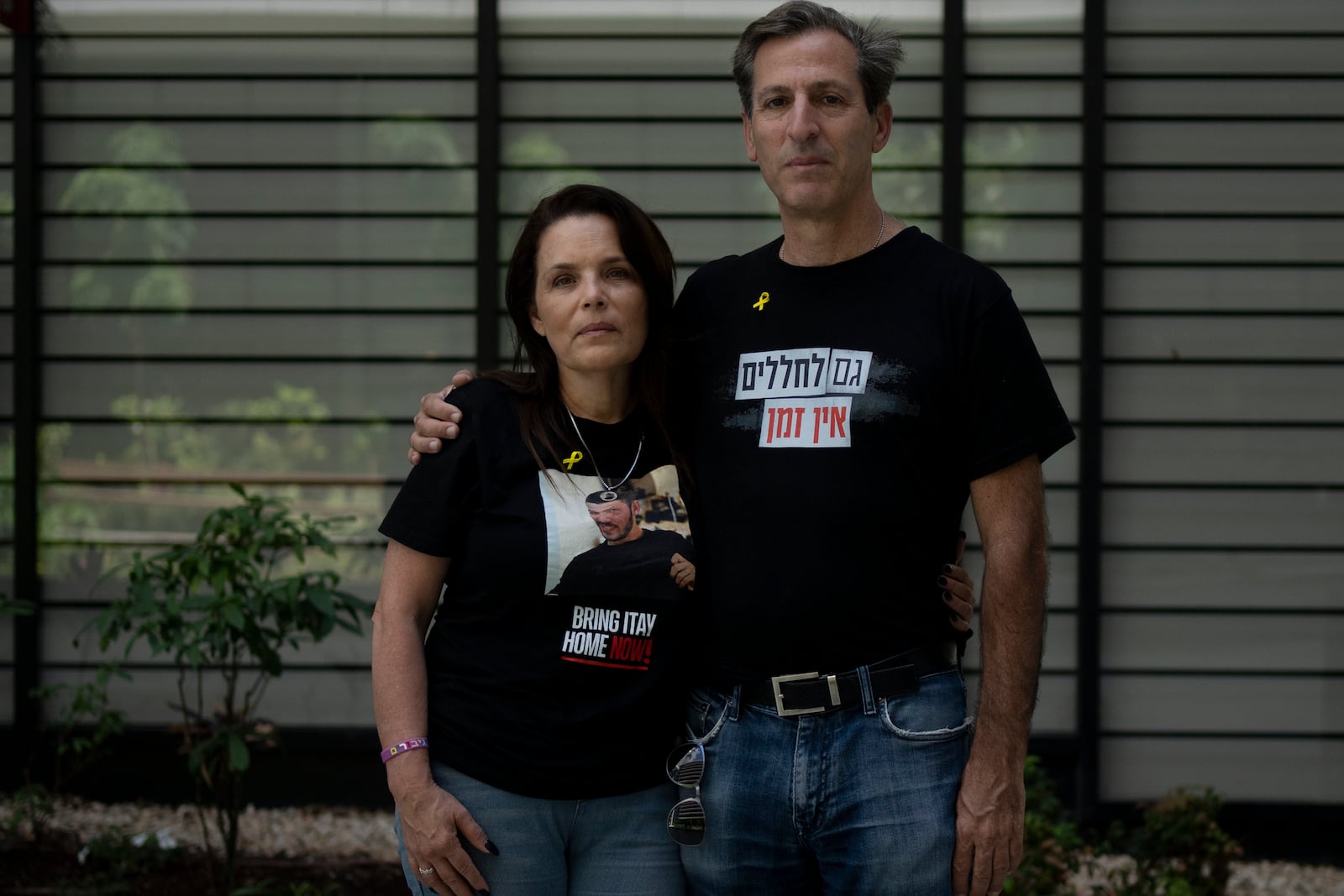 FILE - Hagit, left, and Ruby Chen, parents of fallen Israeli soldier Itay Chen, pose for a portrait in Tel Aviv, on May 8, 2024. (AP Photo/Maya Alleruzzo)