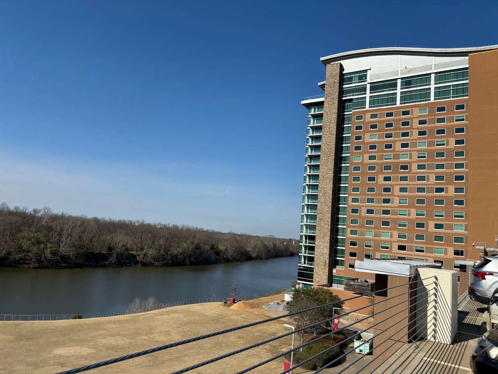 The Wind Creek Casino and Hotel overlooking the Coosa River is seen on Feb. 25, 2024, in Wetumpka, Ala., where the Oklahoma-based Muscogee (Creek) Nation contends Alabama's Poarch Band of Creek Indians broke their legal promise to preserve a historic Muscogee site when they acquired it in 1980. (AP Photo/Kim Chandler)