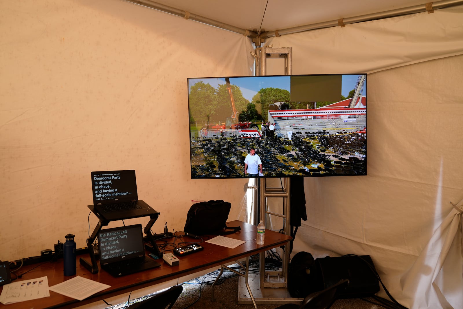 FILE - A view inside a tent at a campaign rally for Republican presidential candidate former President Donald Trump shows a video monitor after Trump was the target of an assassination attempt Saturday, July 13, 2024, in Butler, Pa. (AP Photo/Evan Vucci, File)