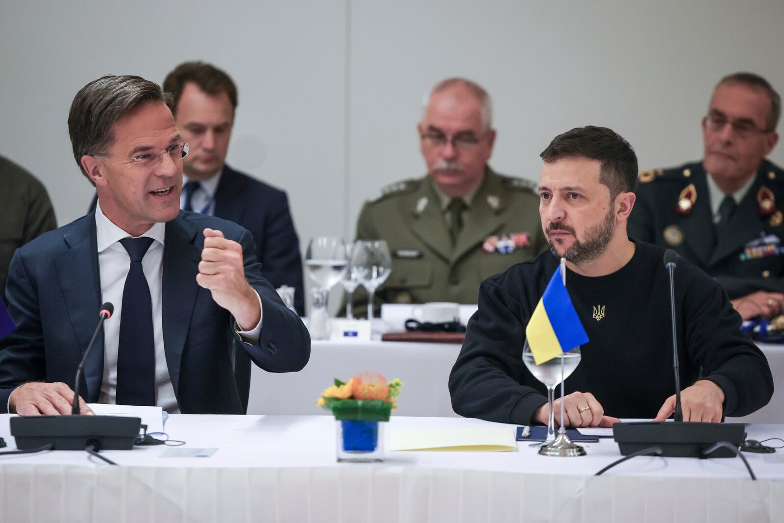 NATO Secretary General Mark Rutte, left, speaks with Ukraine's President Volodymyr Zelenskyy during the NATO-Ukraine Council working dinner at NATO Headquarters in Brussels, Thursday, Oct. 17, 2024. (Olivier Matthys, Pool Photo via AP)