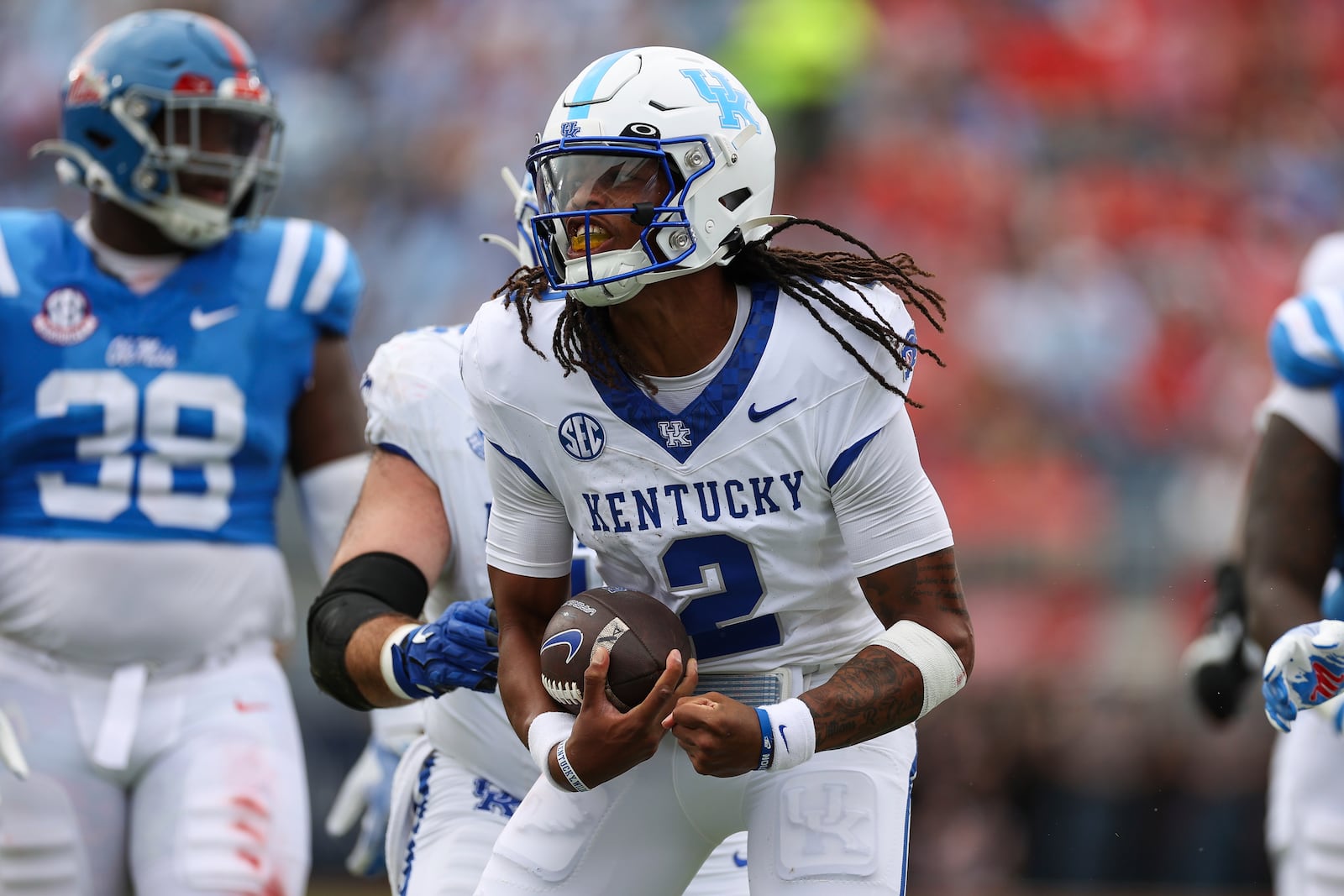 Kentucky quarterback Gavin Wimsatt (2) reacts after running the ball during the first half of an NCAA college football game against Mississippi Saturday, Sept. 28, 2024, in Oxford, Miss. (AP Photo/Randy J. Williams)