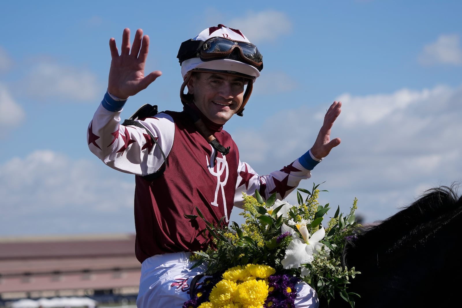 Brian Hernandez Jr. celebrates after riding Thorpedo Anna to victory in the Breeders' Cup Distaff horse race in Del Mar, Calif., Saturday, Nov. 2, 2024. (AP Photo/Gregory Bull)