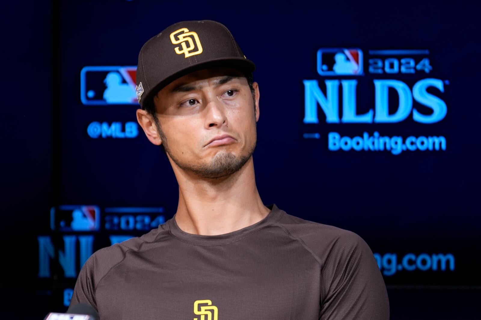 San Diego Padres pitcher Yu Darvish fields questions ahead of Game 5 of a baseball NL Division Series against the Los Angeles Dodgers, Thursday, Oct. 10, 2024, in Los Angeles. (AP Photo/Ashley Landis)