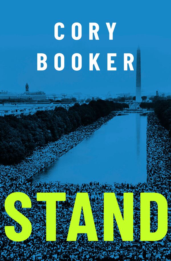 This cover image released by St. Martin's Press shows "Stand" by Cory Booker. (St. Martin's Press via AP)