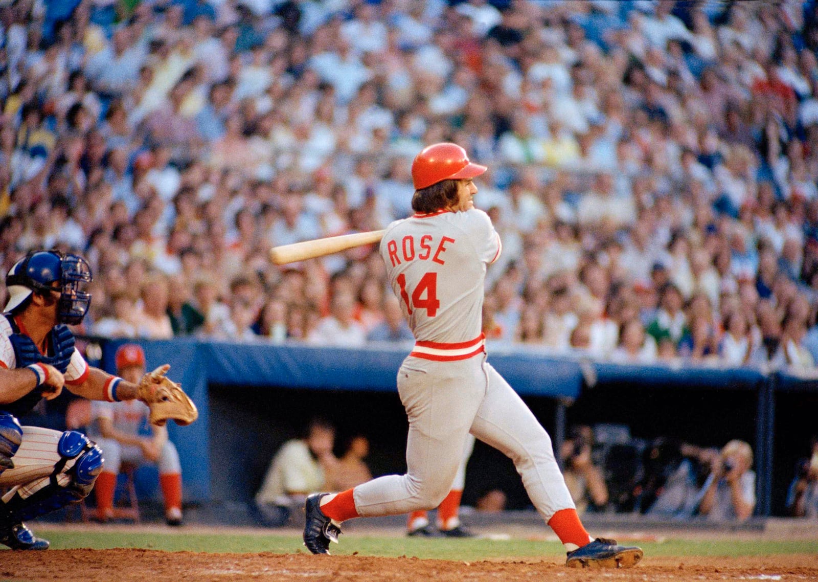 FILE - Pete Rose of the Cincinnati Reds in action at the bat against the Atlanta Braves in Atlanta, Aug. 2, 1978. At left is Atlanta catcher Joe Nolan. (AP Photo, File)