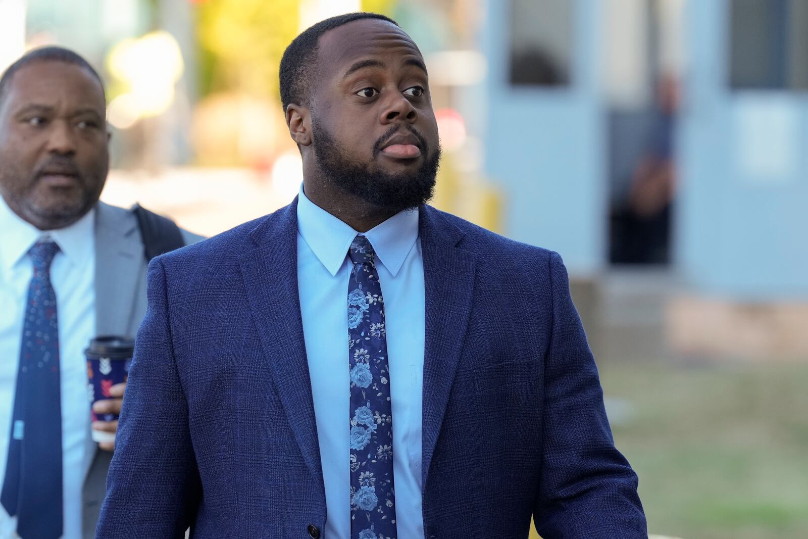 Tadarrius Bean, one of three former Memphis police officers charged in the 2023 fatal beating of Tyre Nichols, arrives at the federal courthouse for the day's proceedings Thursday, Oct. 3, 2024, in Memphis, Tenn. (AP Photo/George Walker IV)