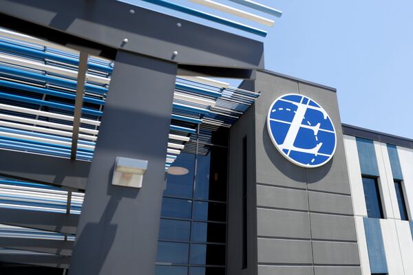 FILE - An exterior look of the Express Scripts mail-in pharmacy warehouse, Tuesday, July 10, 2018, in Florence, N.J. (AP Photo/Julio Cortez,File)