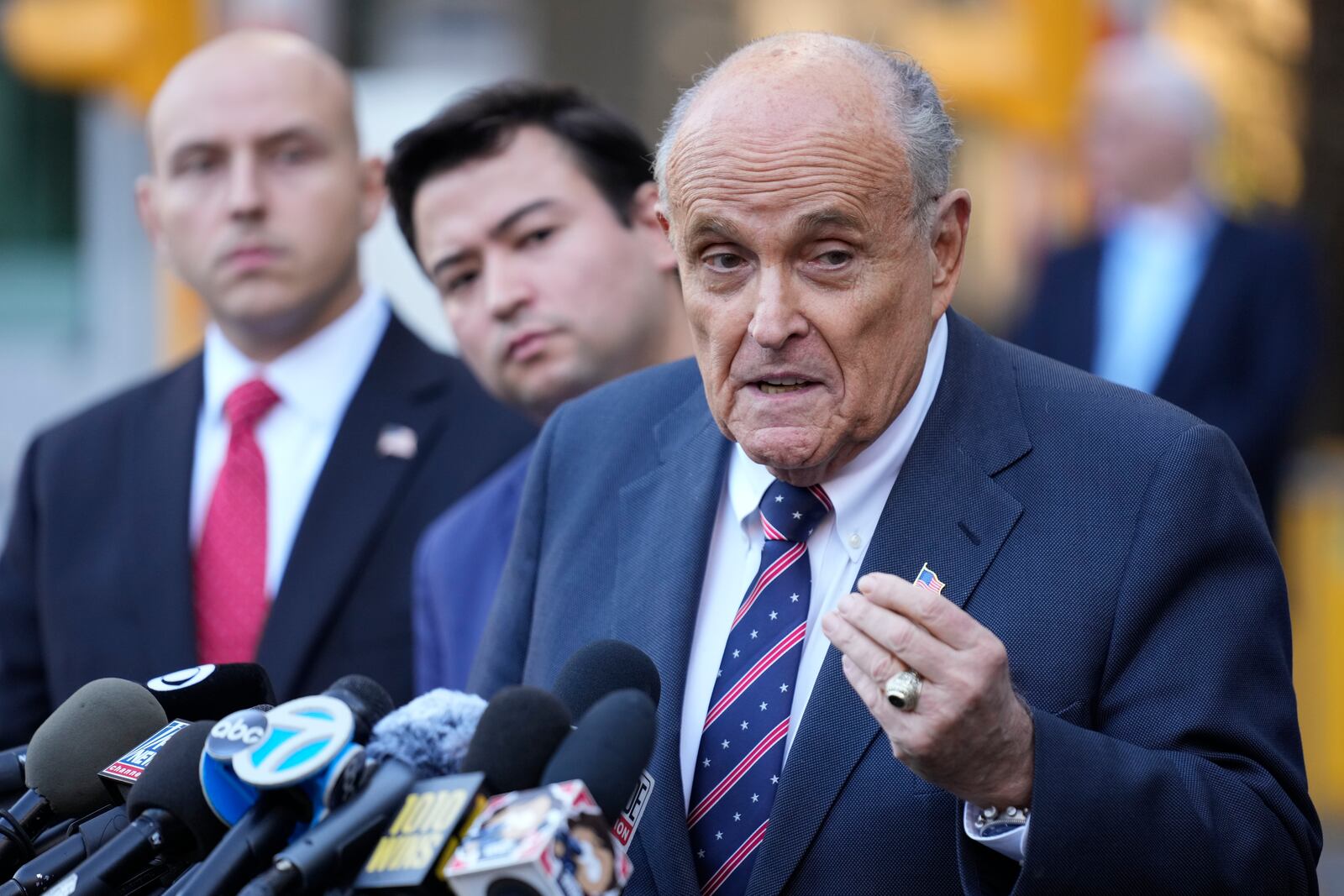 Former New York Mayor Rudy Giuliani speaks the media as he leaves court in New York, Thursday, Nov. 7, 2024. (AP Photo/Seth Wenig)