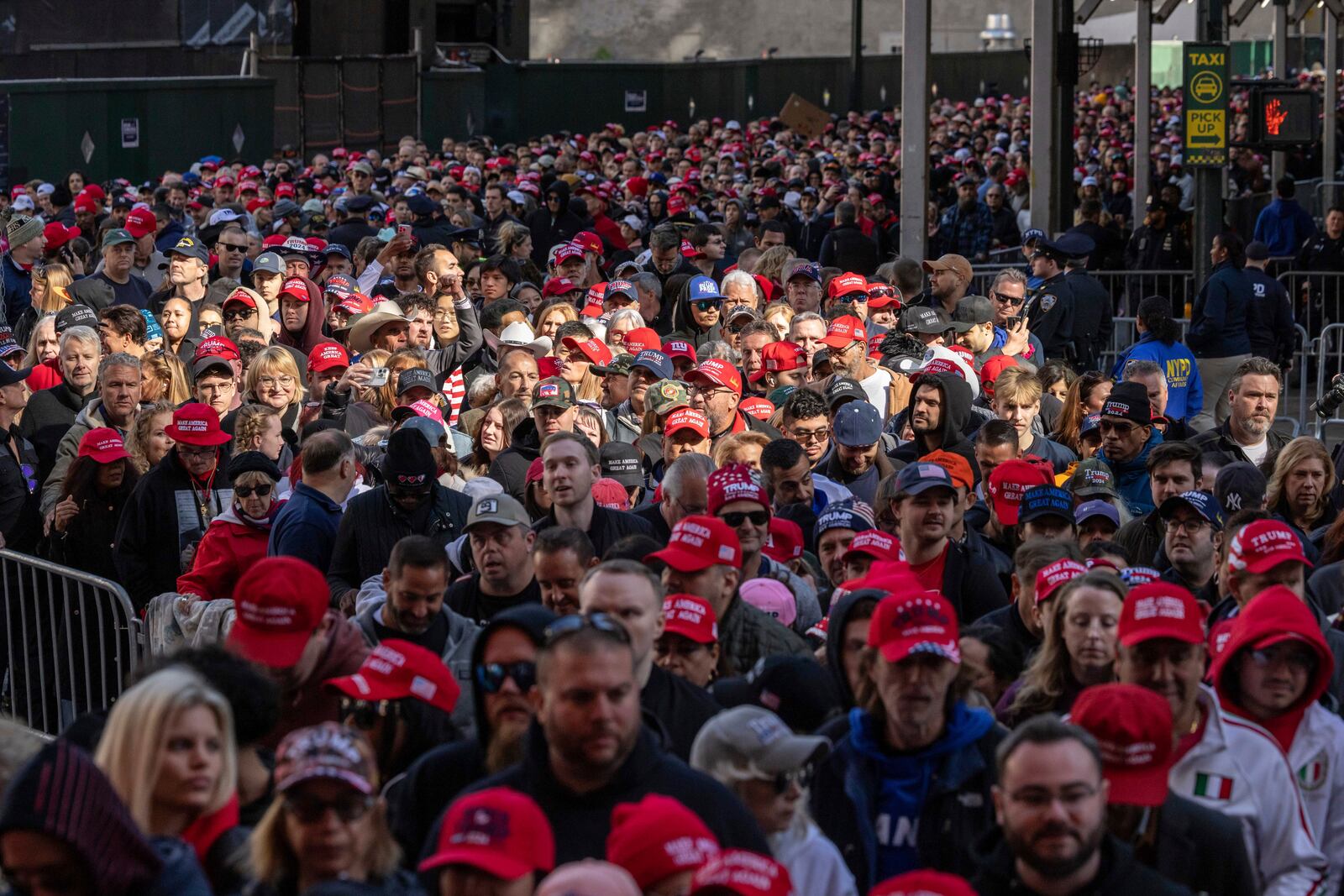 Supporters of Republican presidential nominee former President Donald Trump enter to a campaign rally at Madison Square Garden, Sunday, Oct. 27, 2024, in New York. (AP Photo/Yuki Iwamura)