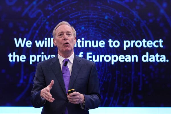 Microsoft's President Brad Smith speaks at a conference on digital resilience during geopolitical volatility in Brussels, Wednesday, April 30, 2025. (AP Photo/Virginia Mayo)