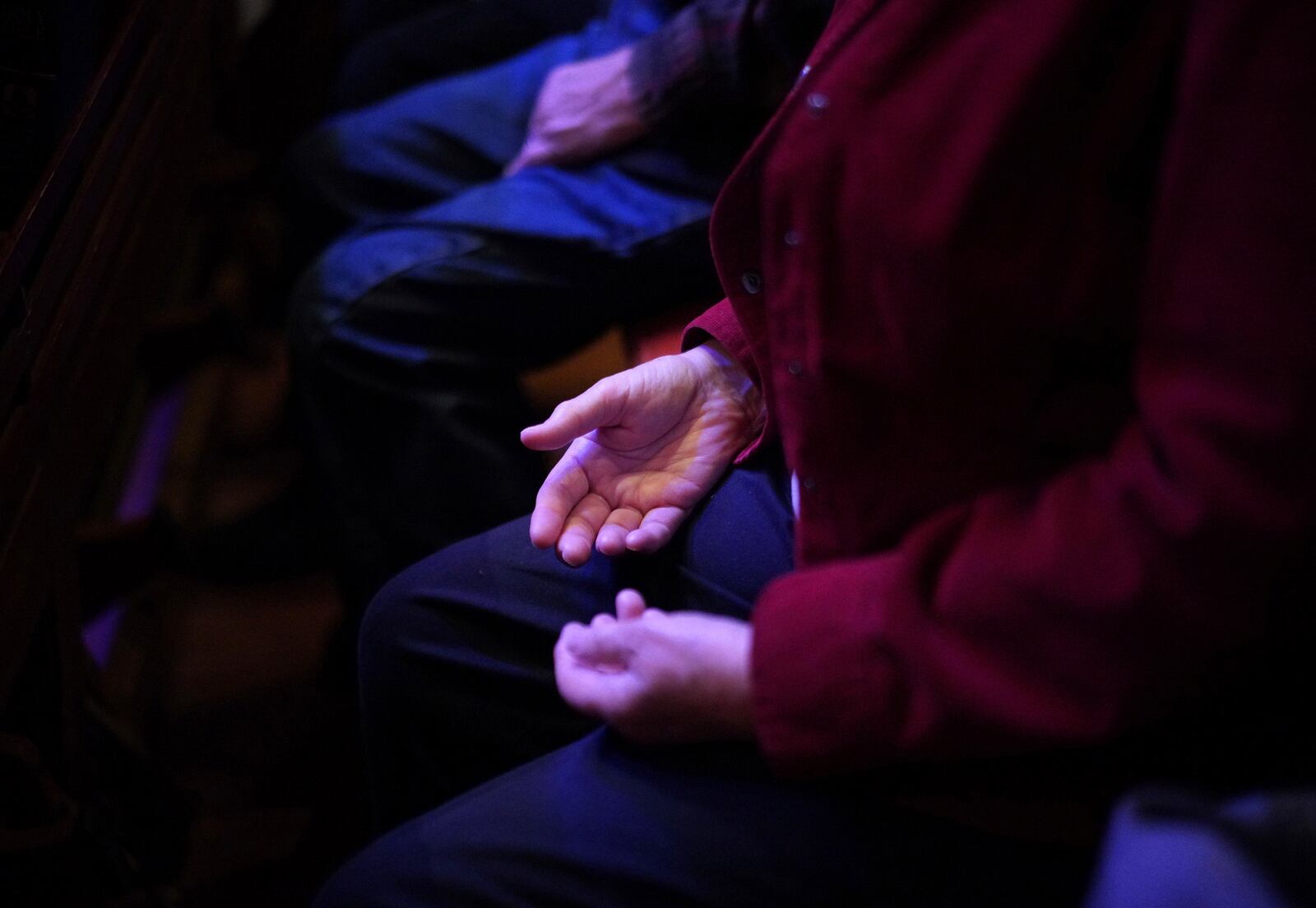 Lissa Olson places her hands on her lap during a meditation centered around the Jesus Prayer, an Orthodox Christian prayer, at St. James Episcopal Church in Lancaster, Pa., on Tuesday, Oct. 15, 2024. (AP Photo/Jessie Wardarski)