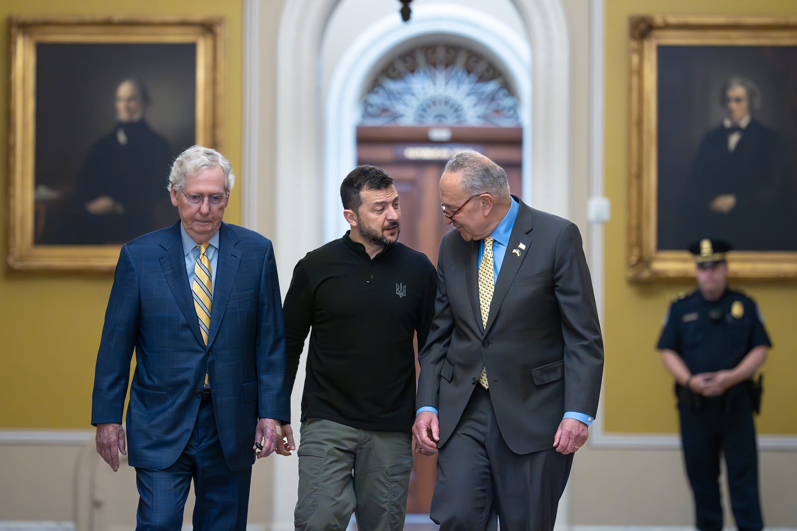 Ukrainian President Volodymyr Zelenskyy, center, walks with Senate Minority Leader Mitch McConnell, R-Ky., left, and Senate Majority Leader Chuck Schumer, D-N.Y., as he arrives for a briefing with lawmakers about the war effort against Russia, at the Capitol in Washington, Thursday, Sept. 26, 2024. (AP Photo/J. Scott Applewhite)