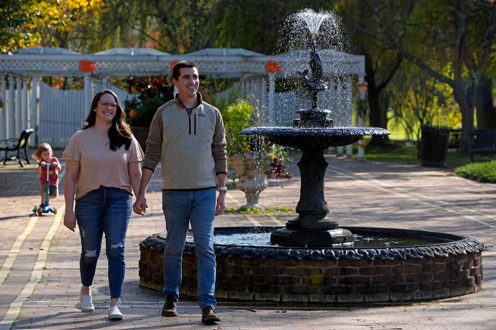 Marc Counterman and Stacy Counterman walk in Talleyrand Park in Bellefonte, Pa., Friday, Oct. 18, 2024. (AP Photo/Gene J. Puskar)