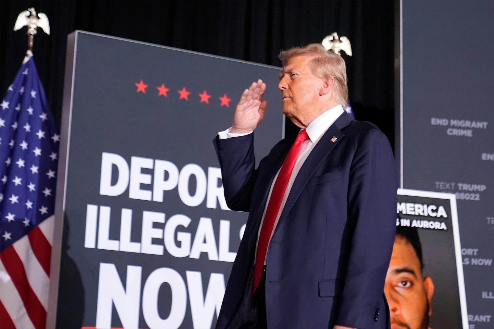 Republican presidential nominee former President Donald Trump salutes at a campaign rally at the Gaylord Rockies Resort & Convention Center, Friday, Oct. 11, 2024, in Aurora, Colo. (AP Photo/Alex Brandon)