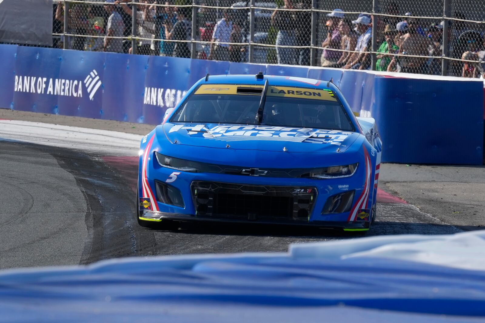 Kyle Larson drives out out Turn 3 during a NASCAR Cup Series auto race at Charlotte Motor Speedway in Concord, N.C., Sunday, Oct. 13, 2024. (AP Photo/Chuck Burton)