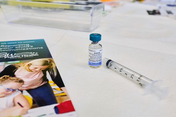 A dose of the measles, mumps, and rubella (MMR) vaccination awaits the next patient during a vaccine clinic at Southwestern Public Health in St. Thomas, Ontario, Canada, on Tuesday, March 4, 2025. (Geoff Robins/The Canadian Press via AP)