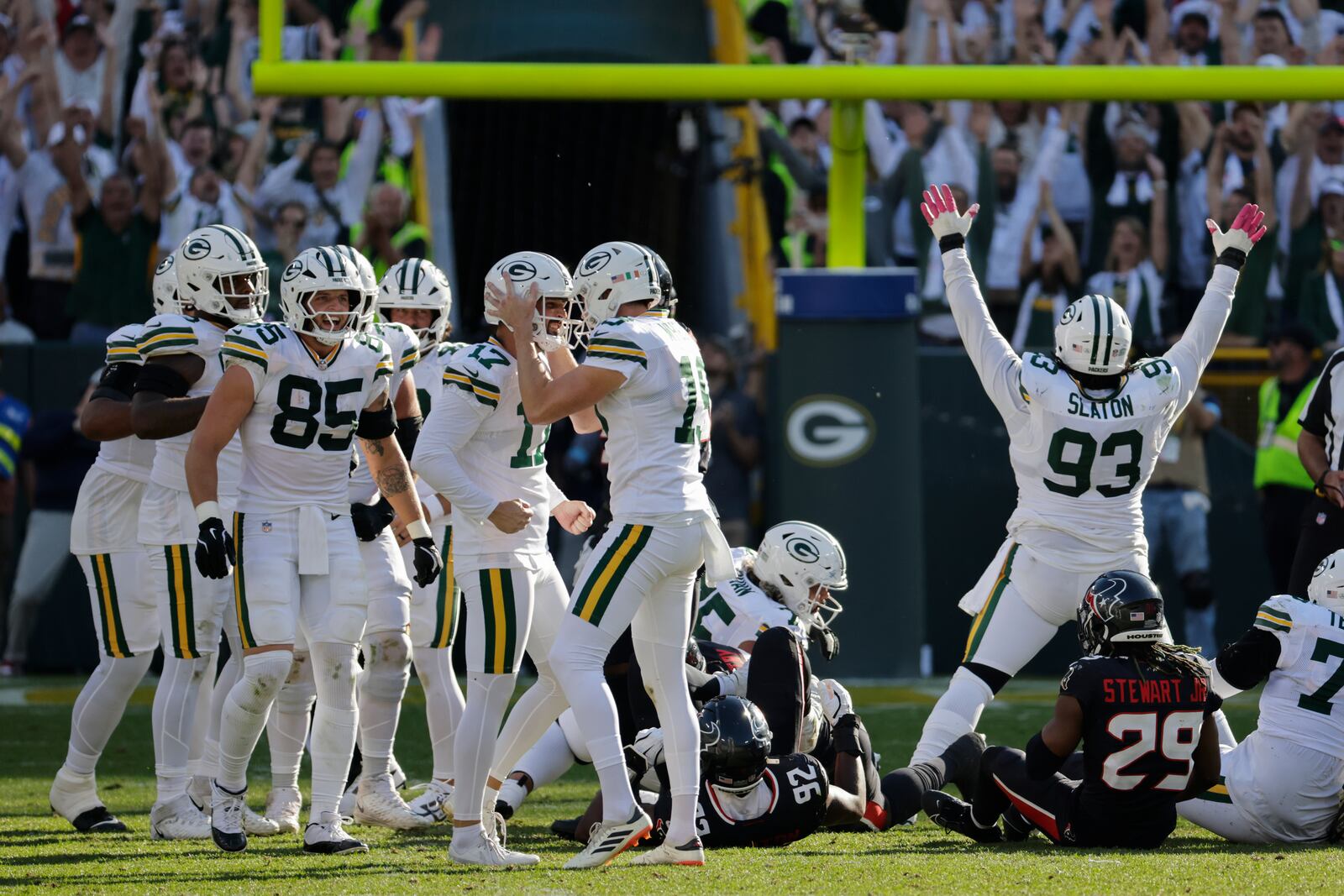 Green Bay Packers place kicker Brandon McManus (17) celebrates with teammates after kicking the game-winning field goal during the second half of an NFL football game against the Houston Texans, Sunday, Oct. 20, 2024, in Green Bay, Wis. The Packers won 24-22. (AP Photo/Mike Roemer)