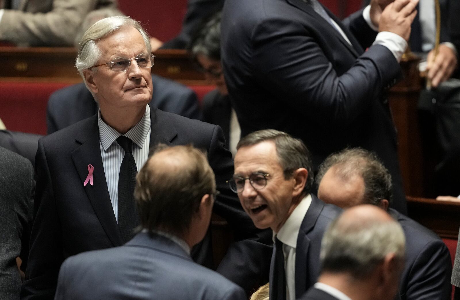 France's Prime Minister Michel Barnier arrives at the National Assembly to deliver a speech, in Paris, Tuesday, Oct. 1, 2024. (AP Photo/Thibault Camus)