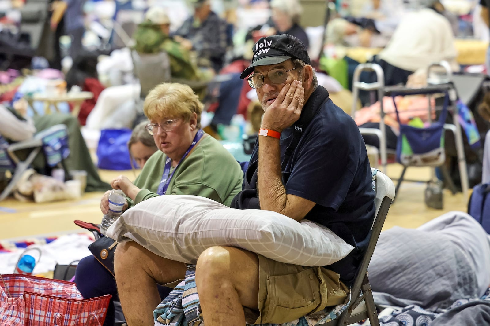 Stephen Gandy shelters in the gymnasium at River Ridge Middle/High School in preparation for Hurricane Milton, Wednesday, Oct. 9, 2024, in New Port Richey, Fla. (AP Photo/Mike Carlson)