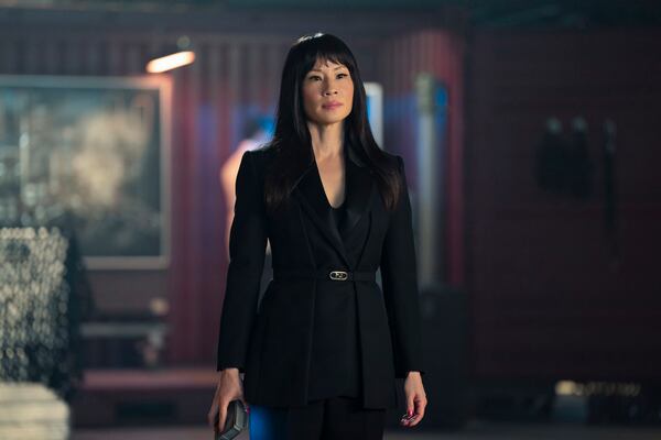 This image released by Prime shows Lucy Liu in a scene from "Red One." (Frank Masi/Prime via AP)