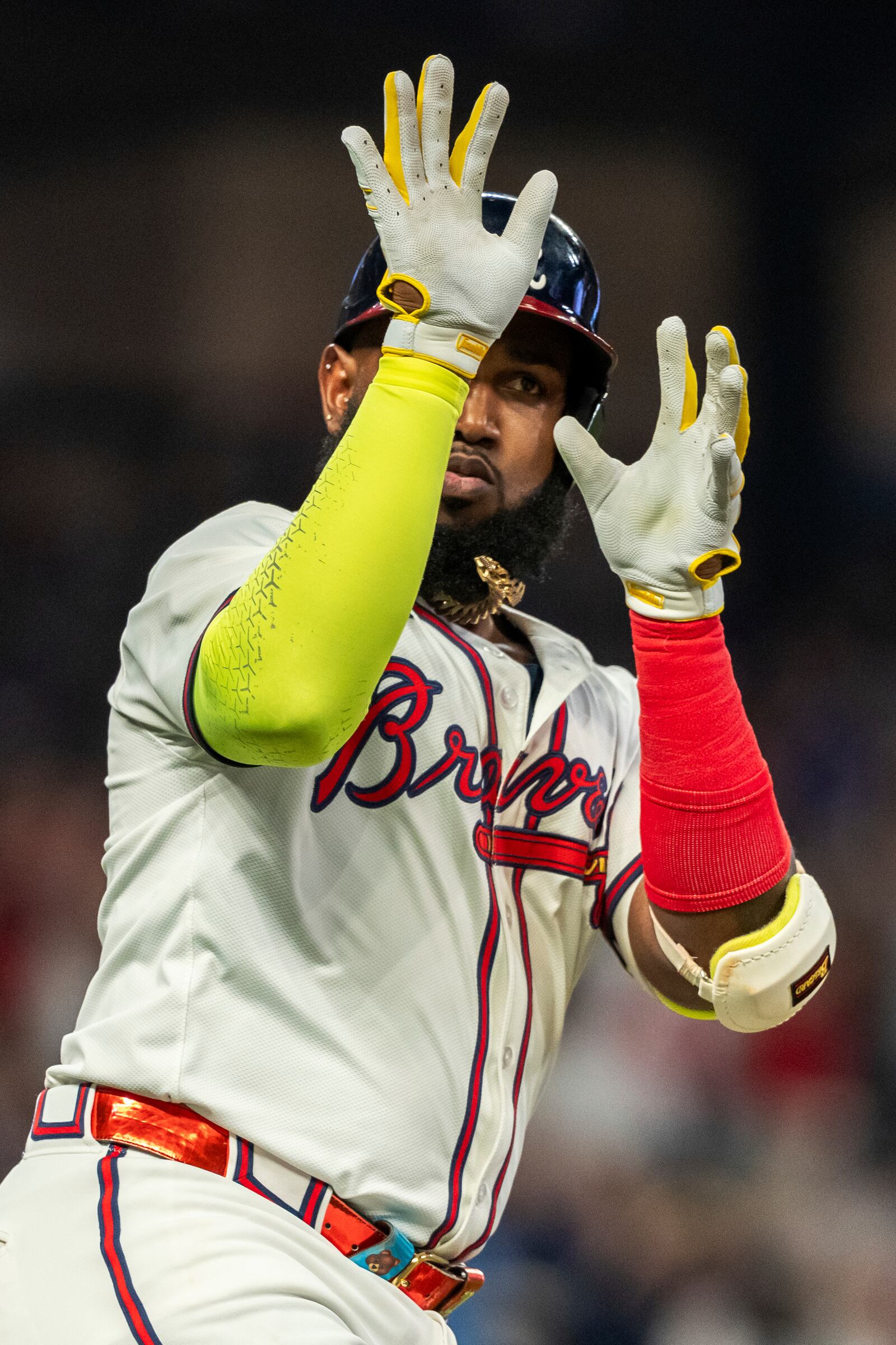 Atlanta Braves' Marcell Ozuna celebrates on the way to first base after hitting a home run in the fifth inning of a baseball game against the New York Mets, Tuesday, Sept. 24, 2024, in Atlanta. (AP Photo/Jason Allen)