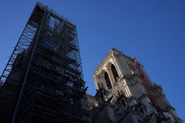 Scaffolding is still clinging to Notre-Dame cathedral, Thursday, Nov. 28, 2024 in Paris. (AP Photo/Michel Euler)